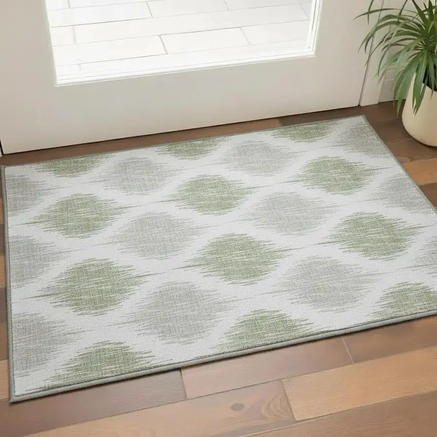 Artichoke Green And Ivory Ikat Washable Area Rug With UV Protection Photo 2