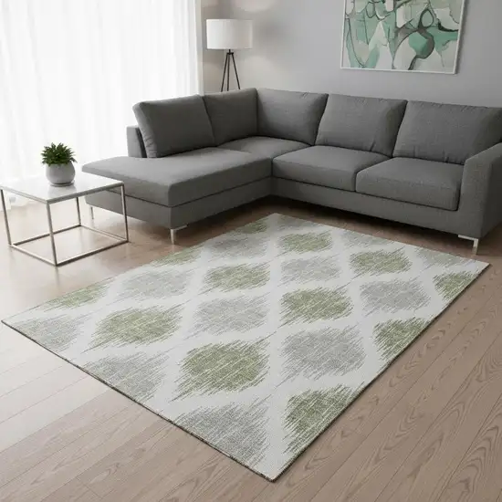 Artichoke Green And Ivory Ikat Washable Area Rug With UV Protection Photo 2