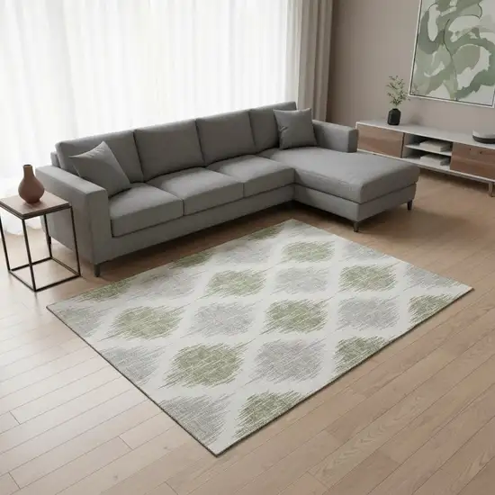 Artichoke Green And Ivory Ikat Washable Area Rug With UV Protection Photo 2