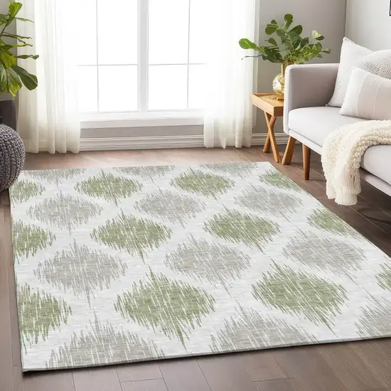 Artichoke Green And Ivory Ikat Washable Area Rug With UV Protection Photo 6