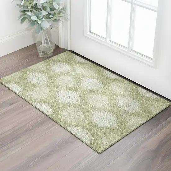 Artichoke Green And Ivory Ikat Washable Area Rug With UV Protection Photo 1