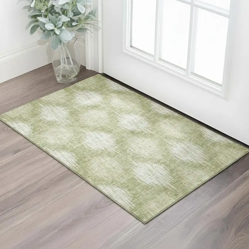 Artichoke Green And Ivory Ikat Washable Area Rug With UV Protection Photo 1