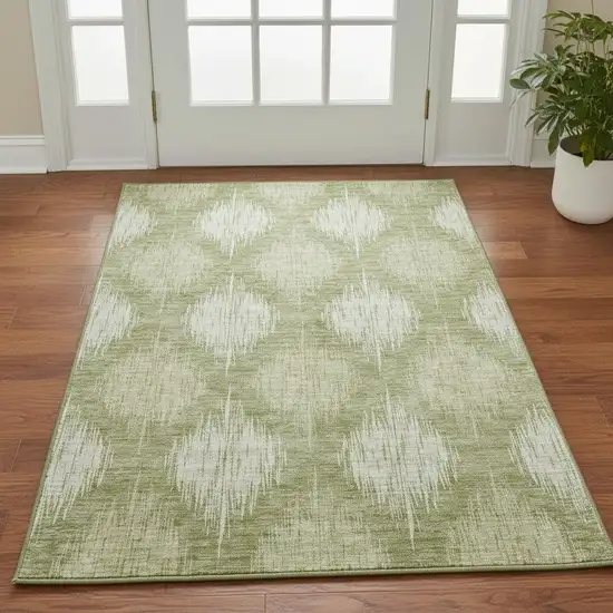 Artichoke Green And Ivory Ikat Washable Area Rug With UV Protection Photo 2
