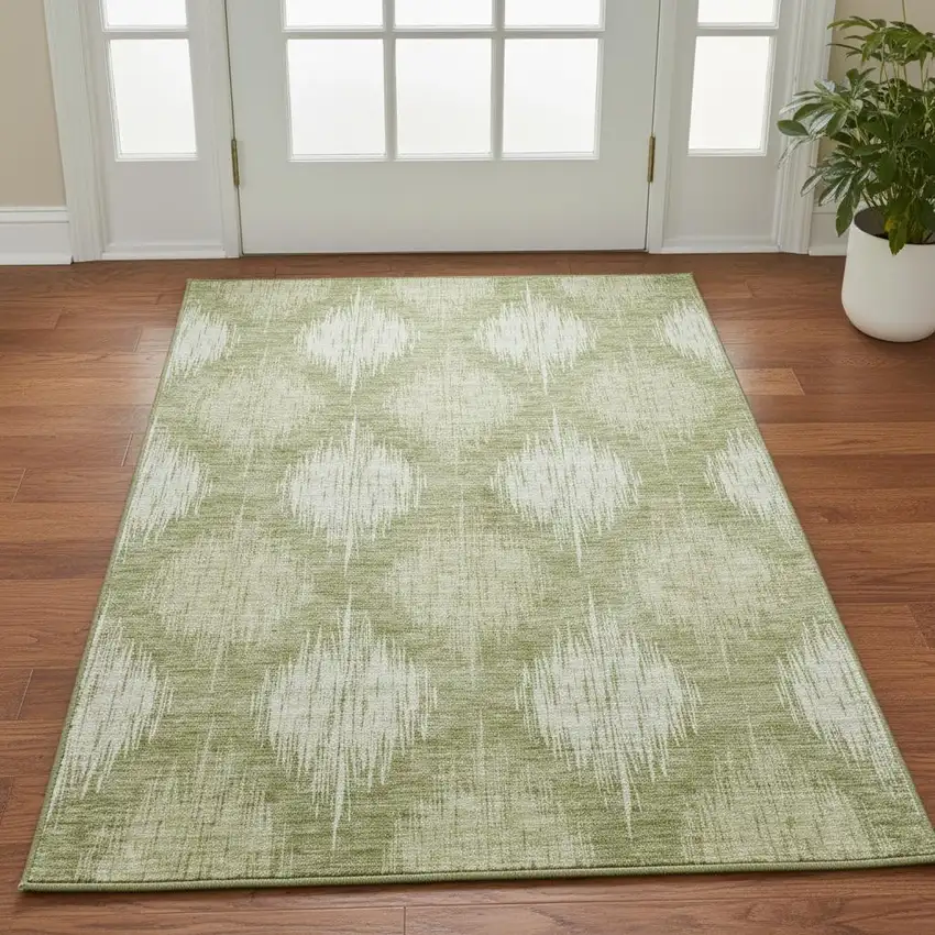 Artichoke Green And Ivory Ikat Washable Area Rug With UV Protection Photo 2