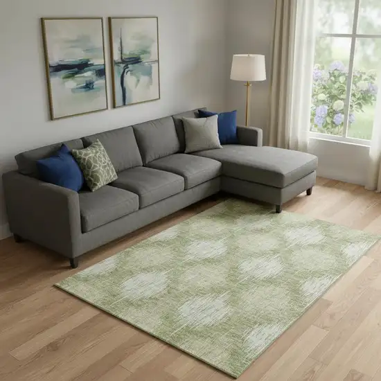 Artichoke Green And Ivory Ikat Washable Area Rug With UV Protection Photo 1