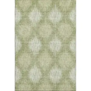 Photo of Artichoke Green And Ivory Ikat Washable Area Rug With UV Protection