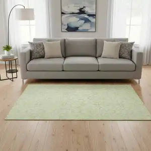 Photo of Artichoke Green And Ivory Medallion Washable Area Rug With UV Protection