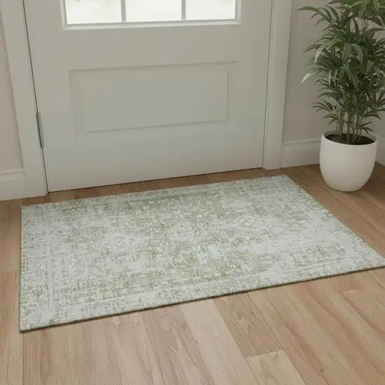 Artichoke Green And Ivory Oriental Washable Area Rug With UV Protection Photo 2