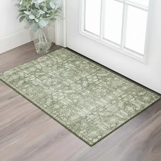 Artichoke Green And Ivory Oriental Washable Area Rug With UV Protection Photo 2