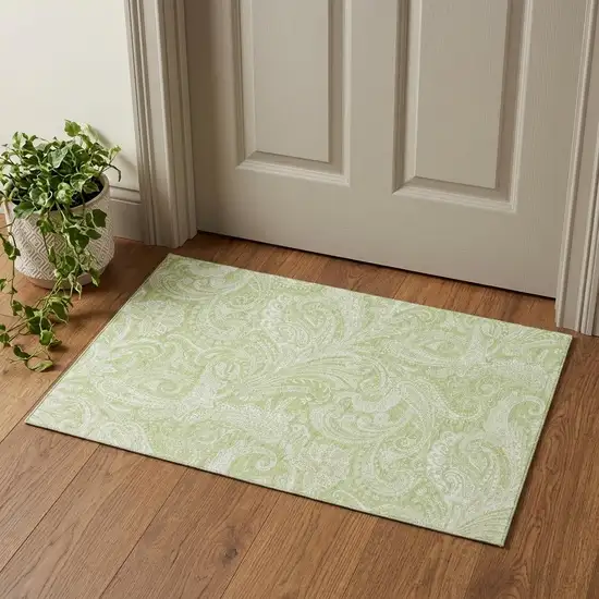 Artichoke Green And Ivory Paisley Washable Area Rug With UV Protection Photo 1