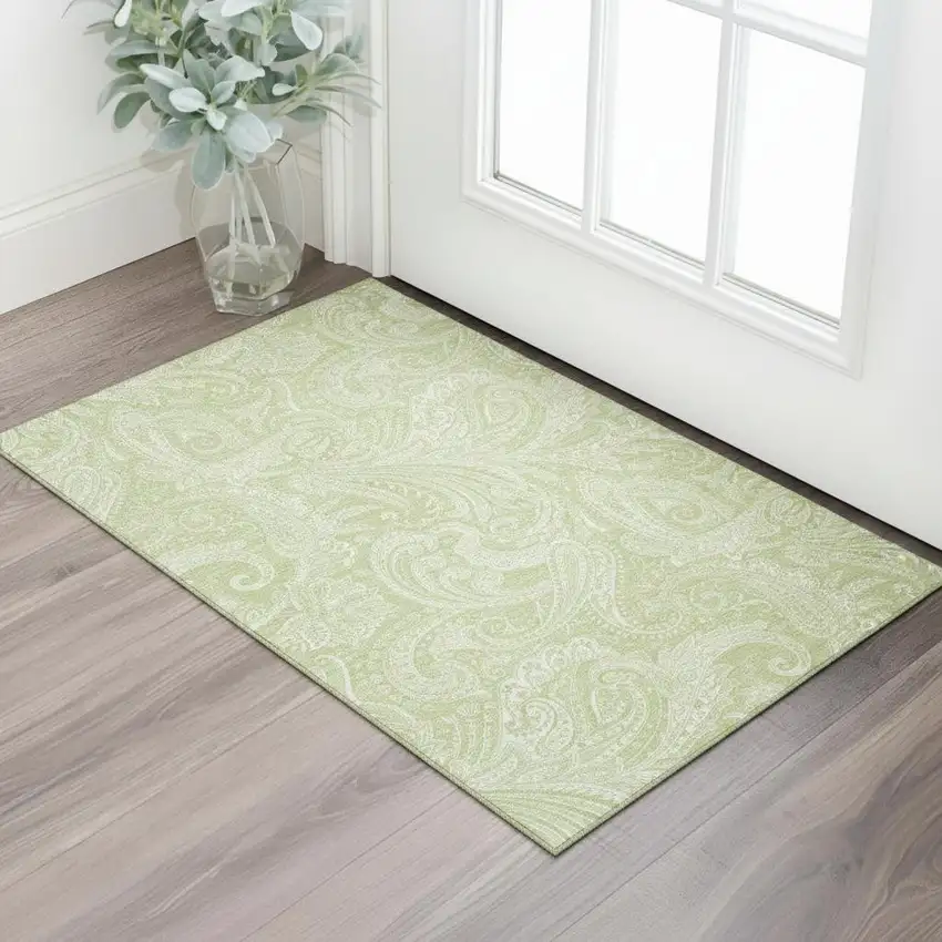 Artichoke Green And Ivory Paisley Washable Area Rug With UV Protection Photo 1