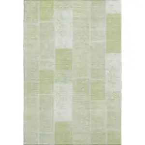Photo of Artichoke Green And Ivory Patchwork Washable Area Rug With UV Protection