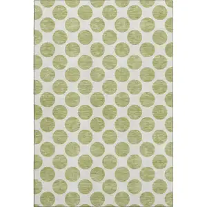 Photo of Artichoke Green And Ivory Polka Dot Washable Area Rug With UV Protection