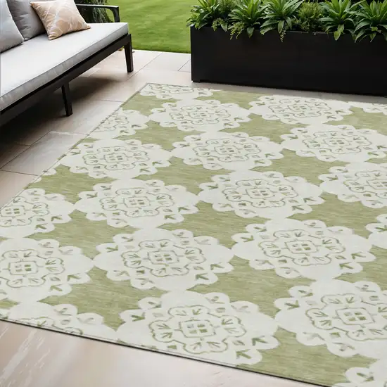 Artichoke Green And Ivory Quatrefoil Washable Indoor Outdoor Area Rug Photo 1