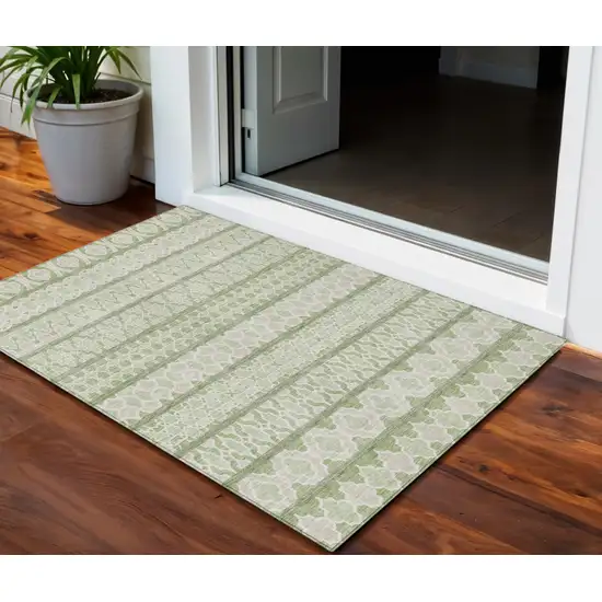 Artichoke Green And Ivory Quatrefoil Washable Indoor Outdoor Area Rug Photo 1