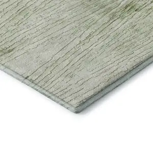 Photo of Artichoke Green And Ivory Striped Washable Area Rug With UV Protection
