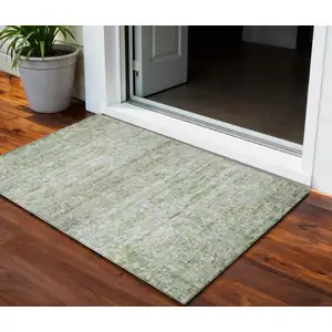 Photo of Artichoke Green And Ivory Striped Washable Indoor Outdoor Area Rug
