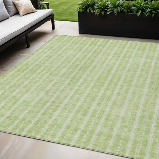 Artichoke Green And Ivory Striped Washable Indoor Outdoor Area Rug Photo 1