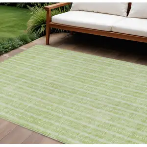 Photo of Artichoke Green And Ivory Striped Washable Indoor Outdoor Area Rug
