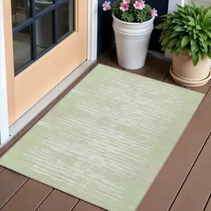Photo of Artichoke Green And Ivory Striped Washable Indoor Outdoor Area Rug