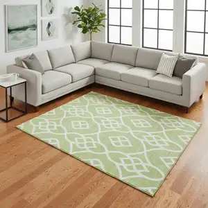 Photo of Artichoke Green And Ivory Trellis Washable Area Rug With UV Protection