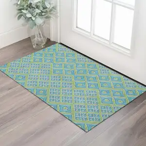Photo of Artichoke Green And Teal Geometric Washable Area Rug With UV Protection