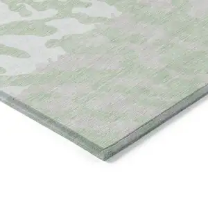 Photo of Artichoke Green Beige And Ivory Animal Print Washable Indoor Outdoor Area Rug
