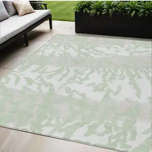 Photo of Artichoke Green Beige And Ivory Animal Print Washable Indoor Outdoor Area Rug