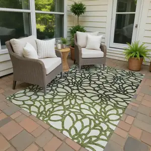 Photo of Artichoke Green Black And Ivory Botanical Leaves Washable Indoor Outdoor Area Rug