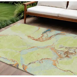 Photo of Artichoke Green Blue And Brown Abstract Washable Indoor Outdoor Area Rug