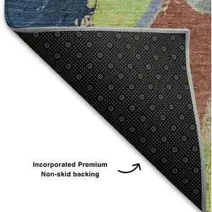 Photo of Artichoke Green Blue And Ivory Abstract Washable Area Rug With UV Protection