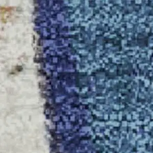 Photo of Artichoke Green Blue And Ivory Abstract Washable Area Rug With UV Protection