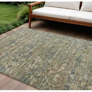 Photo of Artichoke Green Blue And Ivory Ikat Washable Indoor Outdoor Area Rug