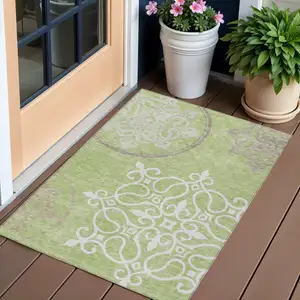 Photo of Artichoke Green Brown And Ivory Floral Medallion Washable Indoor Outdoor Area Rug