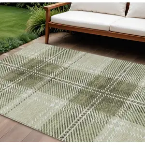 Photo of Artichoke Green Brown And Ivory Plaid Washable Indoor Outdoor Area Rug