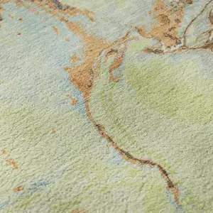 Photo of Artichoke Green Copper And Teal Abstract Washable Area Rug With UV Protection