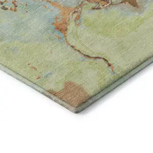 Photo of Artichoke Green Copper And Teal Abstract Washable Area Rug With UV Protection