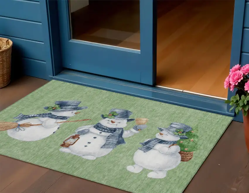 Artichoke Green Denim Blue And Ivory Snowmen Washable Indoor Outdoor Area Rug Photo 1