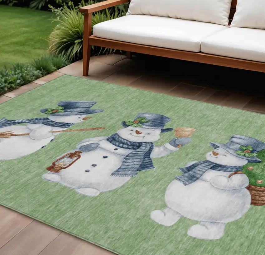 Artichoke Green Denim Blue And Ivory Snowmen Washable Indoor Outdoor Area Rug Photo 1