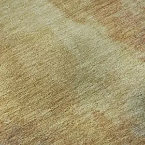 Photo of Artichoke Green Gold And Copper Abstract Washable Area Rug With UV Protection