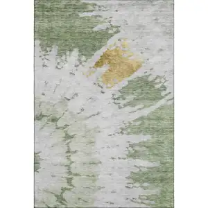 Photo of Artichoke Green Gold And Ivory Abstract Washable Area Rug With UV Protection