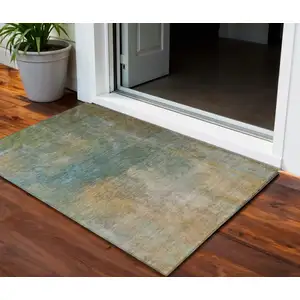 Photo of Artichoke Green Gray And Gold Abstract Washable Indoor Outdoor Area Rug