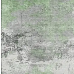 Photo of Artichoke Green Gray And Ivory Abstract Washable Area Rug With UV Protection