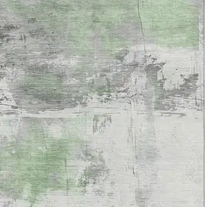 Photo of Artichoke Green Gray And Ivory Abstract Washable Area Rug With UV Protection
