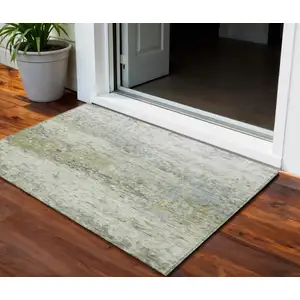Photo of Artichoke Green Gray And Ivory Abstract Washable Indoor Outdoor Area Rug