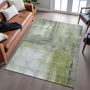 Photo of Artichoke Green Gray And Silver Abstract Washable Area Rug With UV Protection