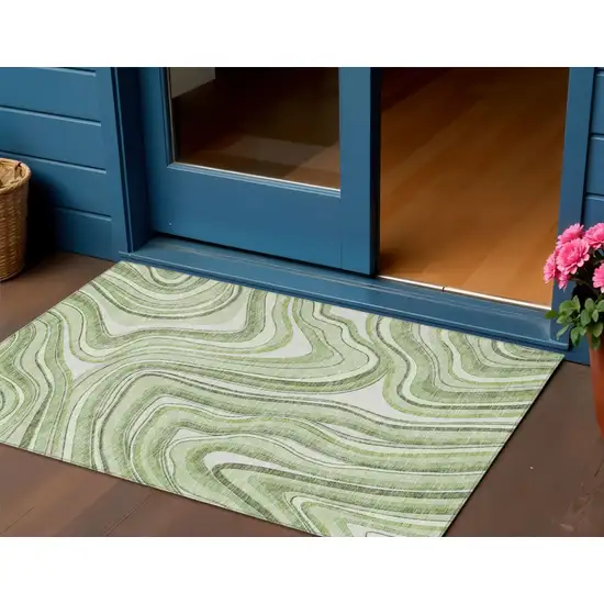 Artichoke Green Green And Ivory Abstract Washable Indoor Outdoor Area Rug Photo 1