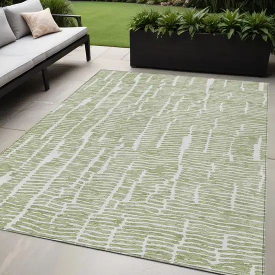 Artichoke Green Green And Ivory Abstract Washable Indoor Outdoor Area Rug Photo 1