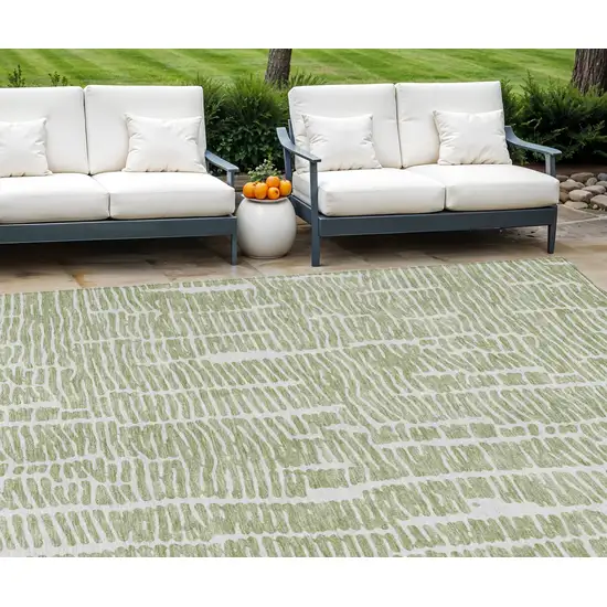 Artichoke Green Green And Ivory Abstract Washable Indoor Outdoor Area Rug Photo 1