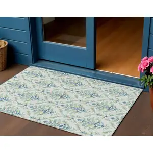 Photo of Artichoke Green Ivory And Blue Damask Washable Indoor Outdoor Area Rug